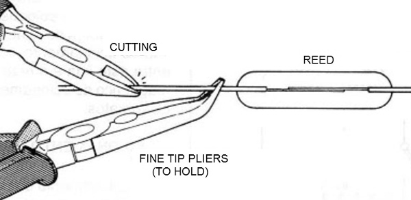 Figure 21 - Cutting a Reed Switch Terminal
